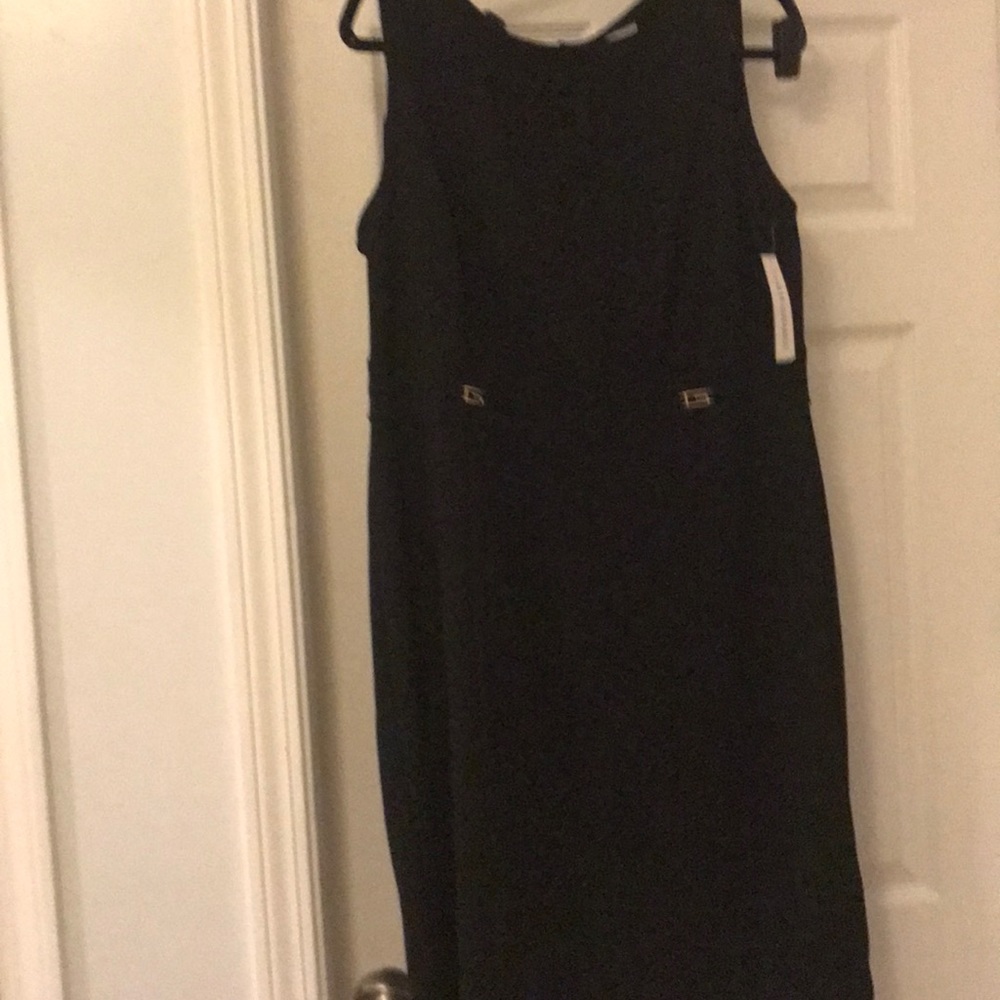 Black sheath dress with gold buckle detail